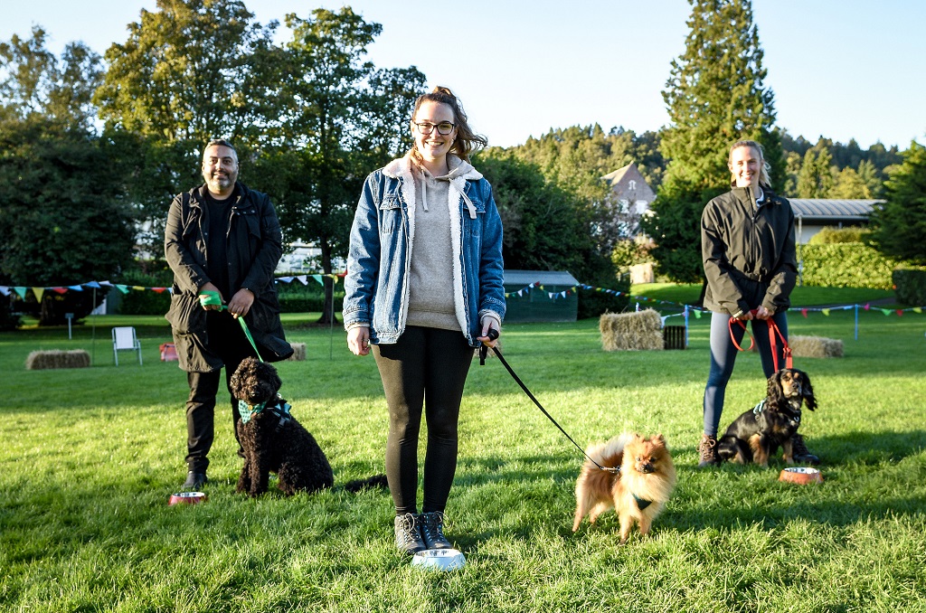 WARNING: Embargoed for publication until 00:00:01 on 10/12/2021 - Programme Name: Scotland's Best Dog - TX: 16/12/2021 - Episode: n/a (No. 5) - Picture Shows: 'Angus' a one-year-old Black Goldendoodle and his owner Tony from Glasgow; 'Bear' a two-year-old Pomeranian and her owner Meagh from Dumfries and Galloway; and 'Poppy' a two-year-old working Cocker Spaniel and her owner, Olympic swimmer Hannah Miley from Aberdeen.   - (C) Red Sky Productions - Photographer: Thomas Skinner