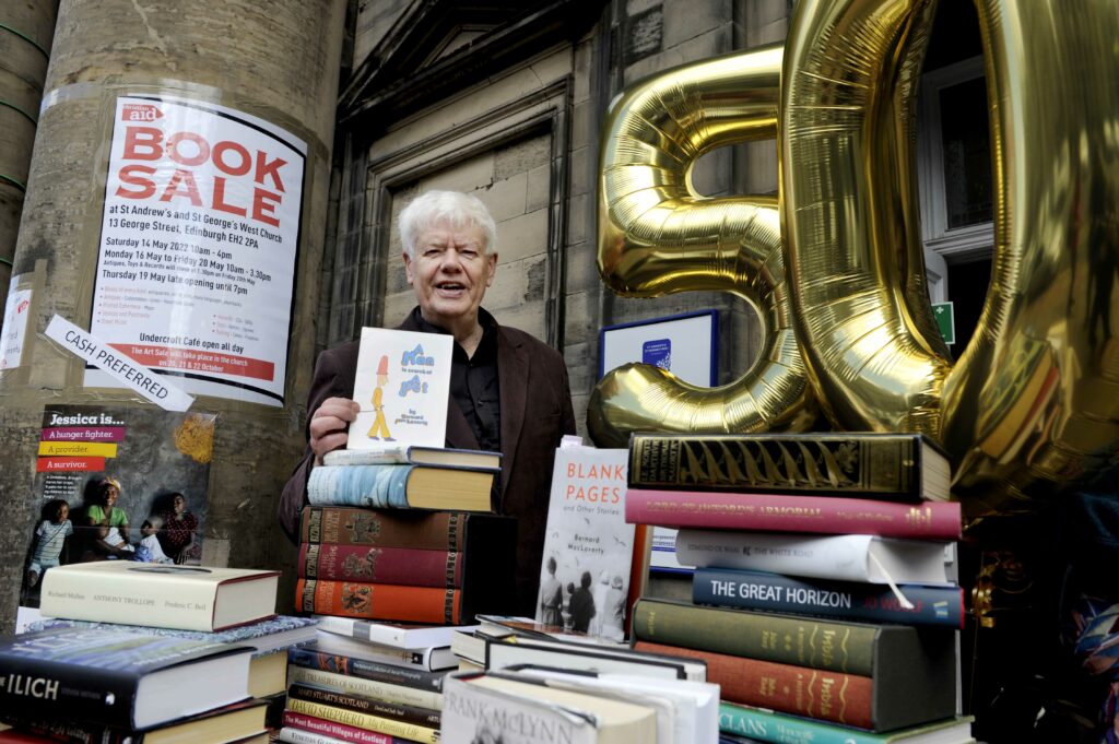 FREE PICTURE:  50th Book Sale for Christian Aid, Edinburgh, 12/05/2022:
Book fans delight as Christian Aid book sale on Edinburgh’s George Street returns for its 50th sale:
Scotland’s biggest charity book sale opens its doors for the 50th time this Saturday.  In the last decade alone, the book sale at St Andrew’s and St George’s West Church on George Street, Edinburgh, has raised over a million pounds for international development charity Christian Aid.  
  Pictured on the steps of the St Andrew’s and St George’s West Church  is Glasgow-based writer Bernard MacLaverty, author of five novels and six short-story books, and the patron of this year’s 50th sale. Bernard has revealed that he has attended the sale since the mid-1970s and much enjoys buying books.
  The sale opens this Saturday 14th May (2022) and runs again from Monday 16th to Friday 20th May - see:: https://www.stagw.org.uk/
  More information in the accompanying Press Release and from Christian Aid Scotland media officer Jo Dallas  -  07778 109 541 - jdallas@christian-aid.org
  And more info about Christian Aid Week and events taking place can be found at:  www.christianaid.org.uk/get-involved-locally/scotland/christian-aid-week-in-scotland
  Photography for Christian Aid Scotland from: Colin Hattersley Photography - www.colinhattersley.com - cphattersley@gmail.com - 07974 957 388.