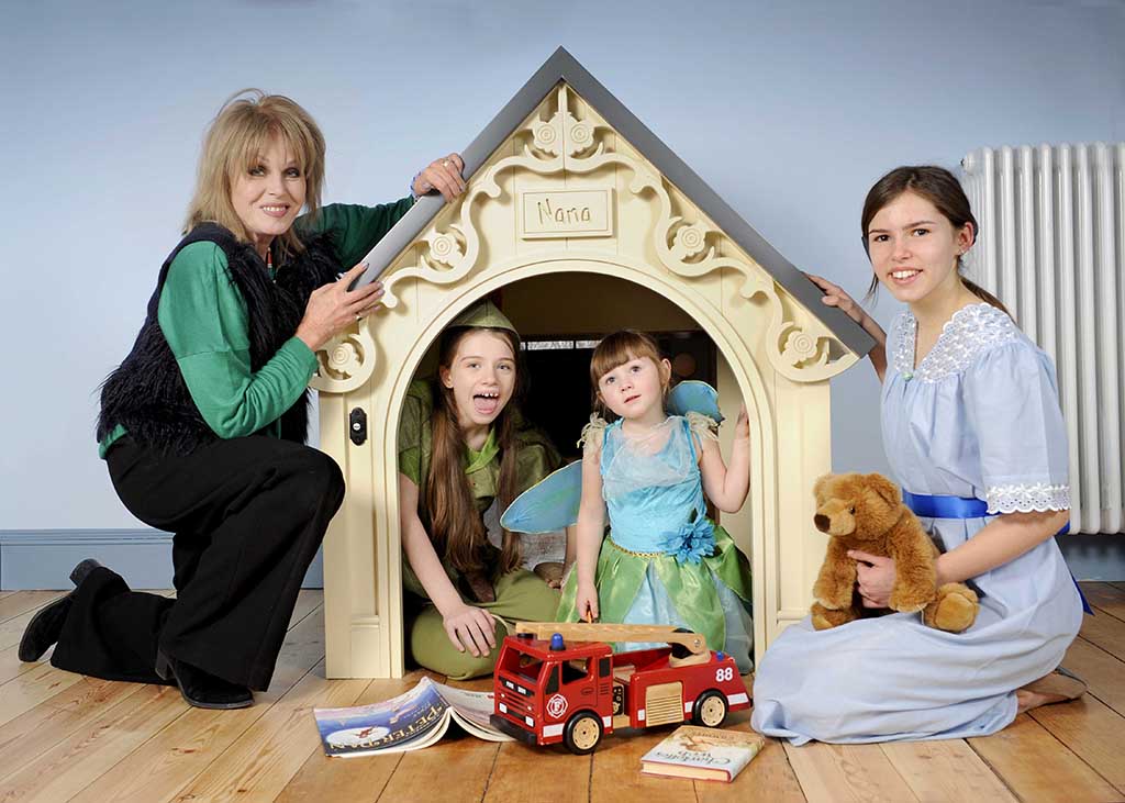 FREE PICTURE:  Joanna Lumley Meets Youngsters at Peter Pan Childrens Centre, Dumfries, Sat 24/11/2018: 
Joanna Lumley visited Moat Brae House in Dumfries to see the restoration work on the house where Peter Pan began. And attended the launch of the Dreams for the Future Festival.
The actor and author is patron of the Peter Pan Moat Brae Trust (PPMBT) and has helped raise £5.8 million to restore the beautiful Georgian house and garden which opens next spring (2019) as the new National Centre for Children’s Literature and Storytelling. 
Dreams for the Future is a pre-opening festival giving a foretaste of what Moat Brae will offer and is part of Scotland’s Year of Young People 2018. It features a series of events from 24 November to 2 December (2018 - see additional press release entitled “Press Release: Peter Pan Childrens Centre Dreams for the Future Festival”).
 During her visit Joanna met young people including some who are helping organise the festival and who are members of Moat Brae’s young people’s group, the JMB Creatives.     
  She became the first person to use the brightly coloured Storytelling Chair, and read to the young people.
  Pictured with Joanna in the children’s attic playroom area of Moat Brae House are (left to right) Louise Jones (as Peter Pan), Isla Naish (as The Fairy) and Emilia Chierici-Black (correct, as Wendy, Peter’s friend).
More information from: Matthew Shelley, PR Consultant for Peter Pan Moat Brae Trust on 07786 704 299 - matthew@scottishfestivalspr.org  or Catherine Colwell on 01387 255 549 or 07793 488 439. 
 Photography for Peter Pan Moat Brae Trust from: Colin Hattersley Photography - www.colinhattersley.com - cphattersley@gmail.com - 07974 957 388.
**FREE Picture - FIRST USE ONLY** - within 30 days of origination of photography; all other publications to be paid for - please contact photographer for details.