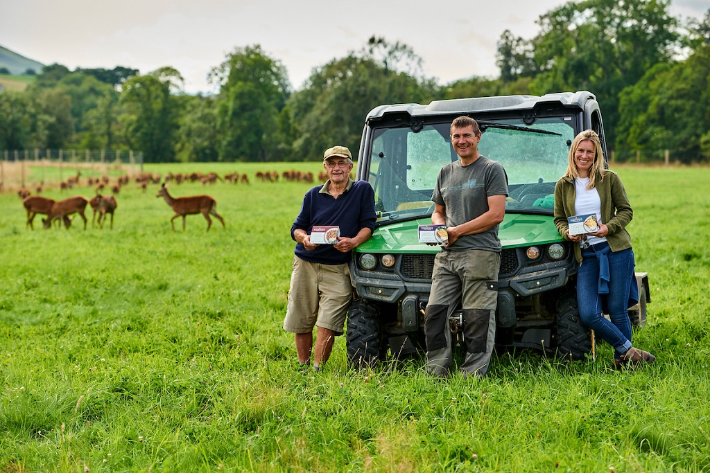 DUNKELD, UK - 2021:  Strathmore Foods, one of UK???s leading ready meal manufacturers, is launching a new brand of venison ready meals, Findowie Farmhouse.  The brand is named after the farm where the venison for these products is reared ??? Meikle Findowie, near Dunkeld in Perthshire. This farm is owned and operated by the Nisbet family who own and run Strathmore Foods. Pictured Colin Nisbet - Founder, with daughter Julie Nisbet - Managing Director and son Douglas Nisbet - Operations Director. (Photograph: MAVERICK PHOTO AGENCY)