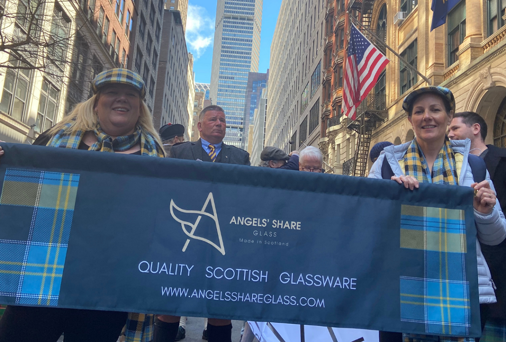 Karen-Somerville-left-and-Helen-Kerr-of-Angels-Share-Glass-at-the-New-York-Tartan-Day-Parade-1rbcmj2vu