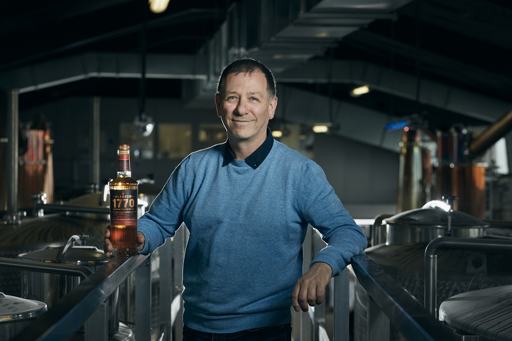 Liam Hughes, CEO of Glasgow Distillery, with the new 70cl bottle of the whisky range.