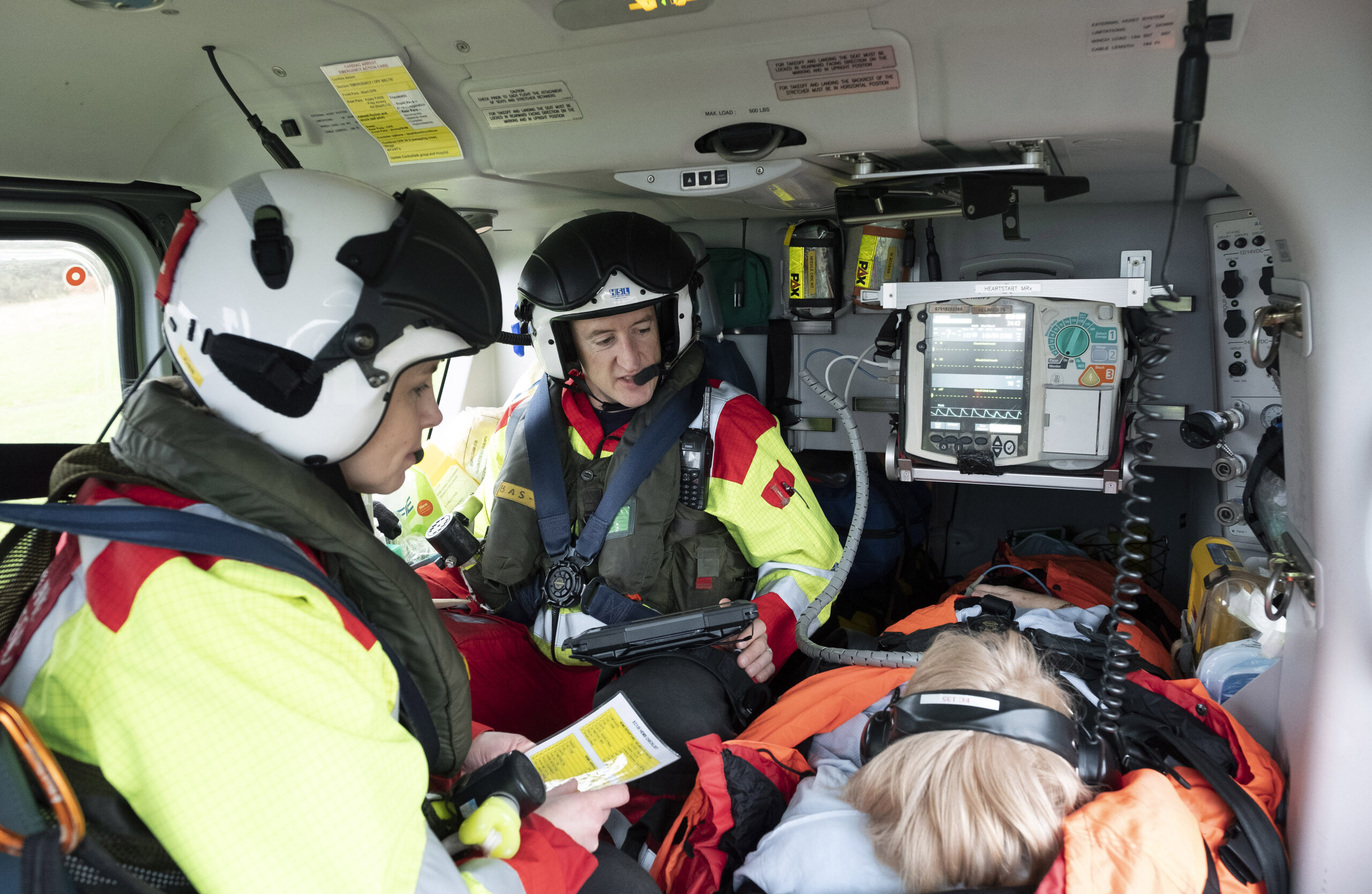 Scotland's Charity Air Ambulance Helimed 76 paramedics Rich Garside and Wendy Jubb pictured with the patient. Picture by Graeme Hart