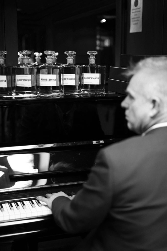 RS-piano-and-bottles-bw-683x1024