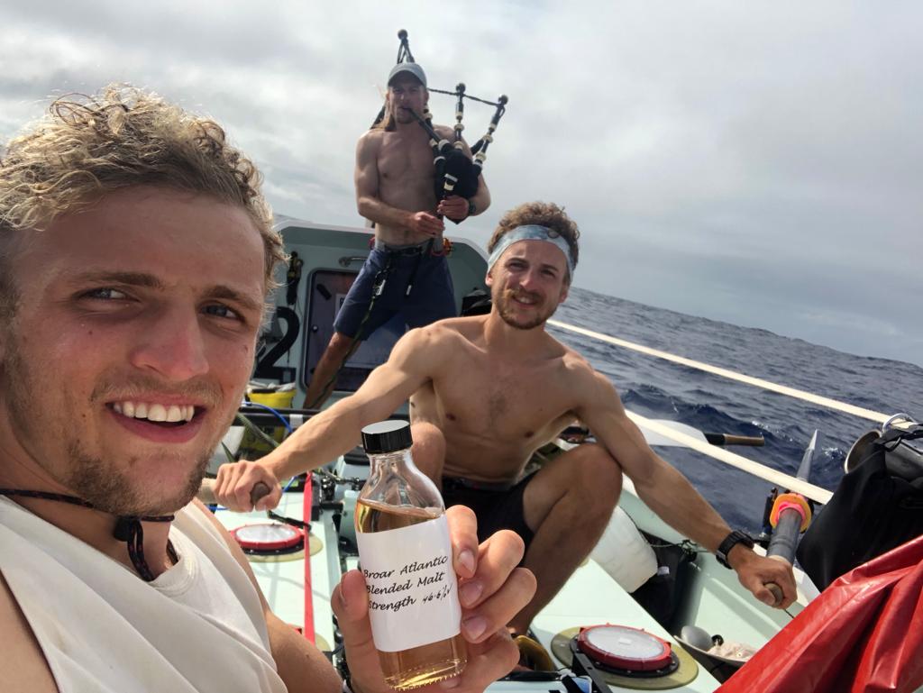 The-Maclean-brothers-drinking-whisky-on-the-boat-s81byclo