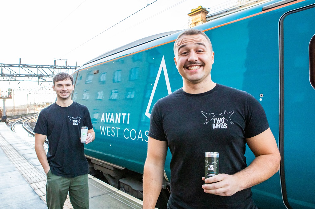 Two Birds founder and Director Daniel Stevenson (with moustache) and Colin Matheson Marketing Manager of Two Birds, visit the Avanti First Class Service at Glasgow Central Station