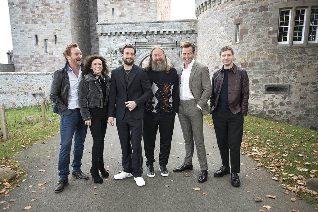 The cast , director and producer of the new Netflix film Outlaw King , outside Borthwick Castle near Edinburgh , Scotland.
The castle was one of the locations used for  shooting during the making of the film.
L to r ..... Tony Curran , Gillian Berrie (producer) . Aaron Taylor-Johnson , David Mackenzie (director) , Chris Pine , Billy Howle
© Wattie Cheung/Netflix……19/10/18