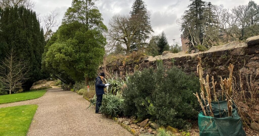 Charlotte auditing at Brodick Castle on the Isle of Arran. Credit: Colin McDowall/National Trust for Scotland