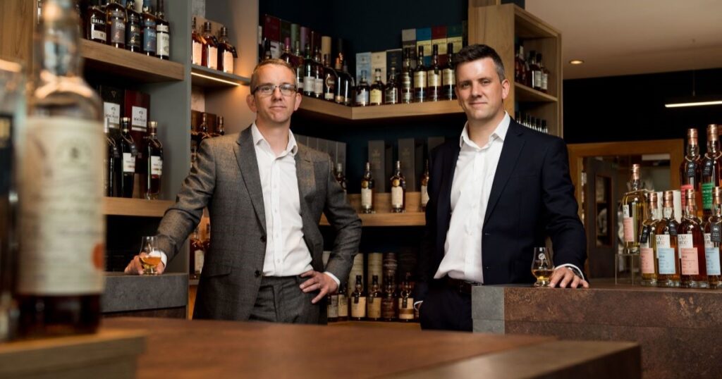 Craig and Daniel Milne of Whisky Hammer raise a dram to celebrate £60 million sales as they celebrate their 100th online auction