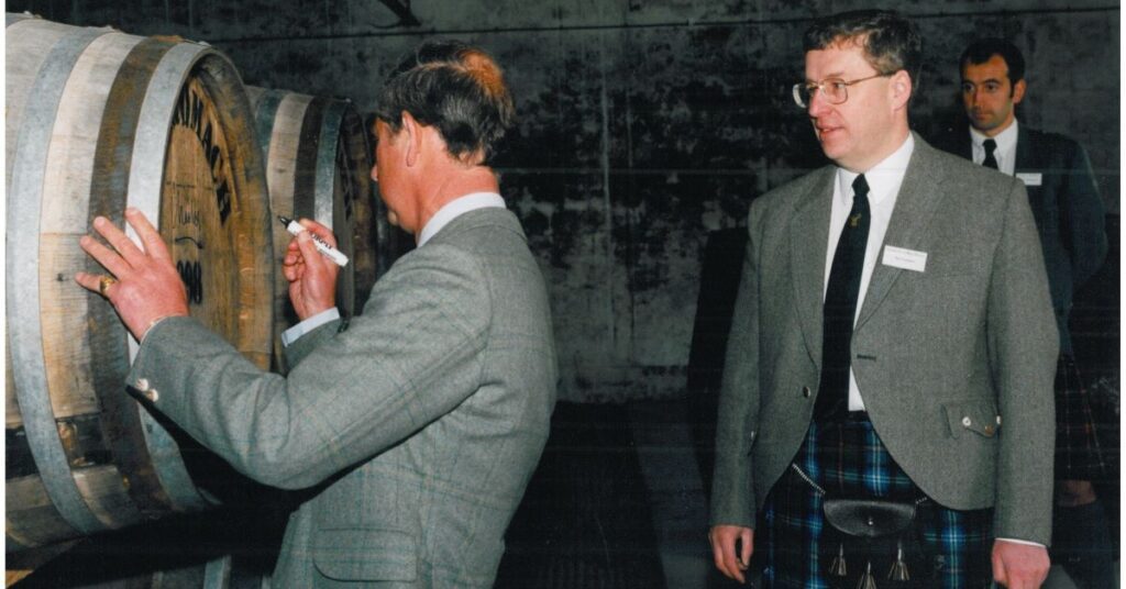 HRH Prince Charles with Ian Urquhart Signing First Cask at Benromach.