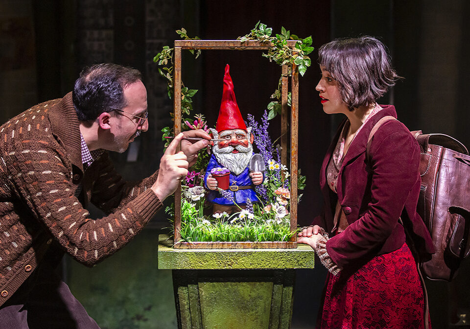 Amelie with her father - and her mother's ashes in the gnome