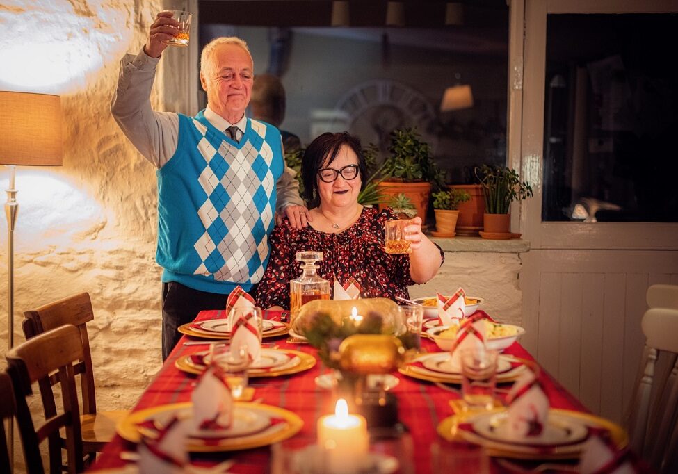 Haggis factory owners Jimmy (Jimmy Chisholm) and Isobel  (Elaine MacKenzie Ellis) are keen to brag about their latest award for their outstanding Haggis (Photo: Velvet Wolf Films /  Tommy Ga-ken Wan / BBC Scotland)