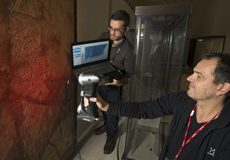 Dr Adrián Maldonado, Glenmorangie Research Fellow, National Museums Scotland and Henrik Zedig ,Länsstyrelsen Västra Götaland, Sweden study a carved stone from the Brough of Birsay on Orkney. (Photo: Neil Hanna)