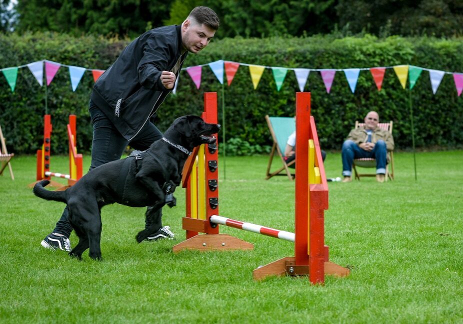 Programme Name: Scotland's Best Dog - TX: 09/12/2021 - Episode: n/a (No. 4) - Picture Shows: 'Harper' the black Labrador and her owner Scott from Rosyth, Fife.  - (C) Red Sky Productions - Photographer: Thomas Skinner