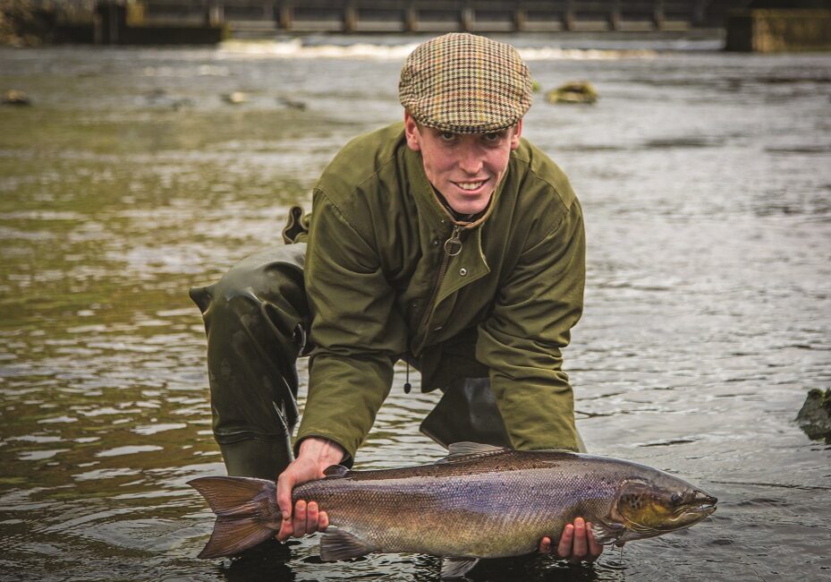Proof that the
change in tactics worked: the 14lb salmon before its release back into the river.