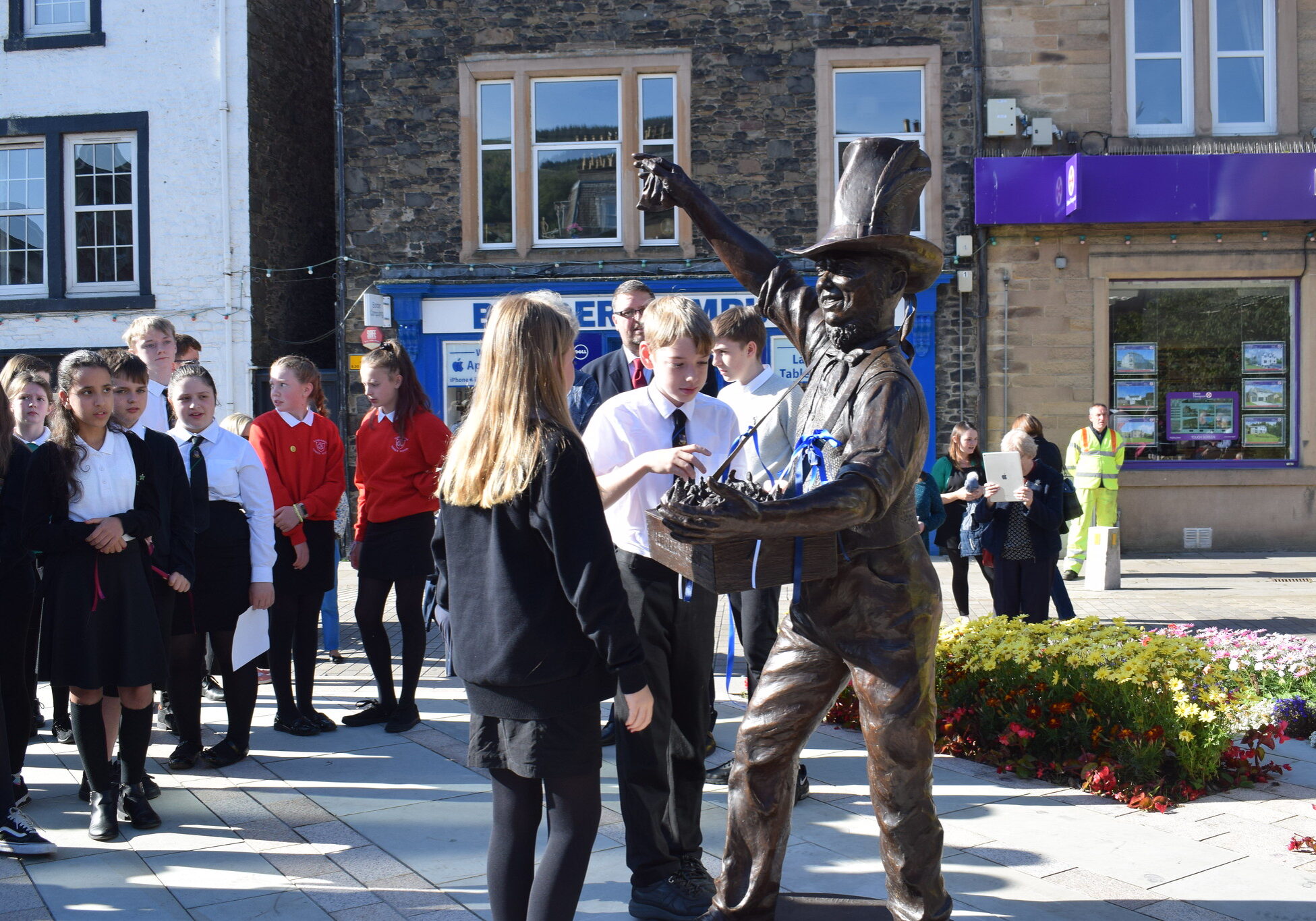 Children were able to get sweets at the statue unveiling