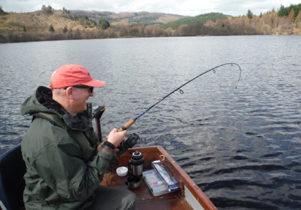 A nice pike putting a good bend in a light rod