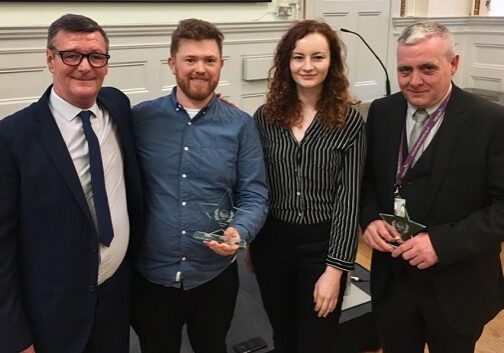 The team with the Phoenix Futures New Year Honours Partnership Award. L-R: Phoenix Futures service user, Dr Paul Murtagh (CAVLP Heritage), Rachel McRae (CAVLP Heritage) and John Deeney, Phoenix Futures Service Manager. (Picture: CAVLP Heritage)