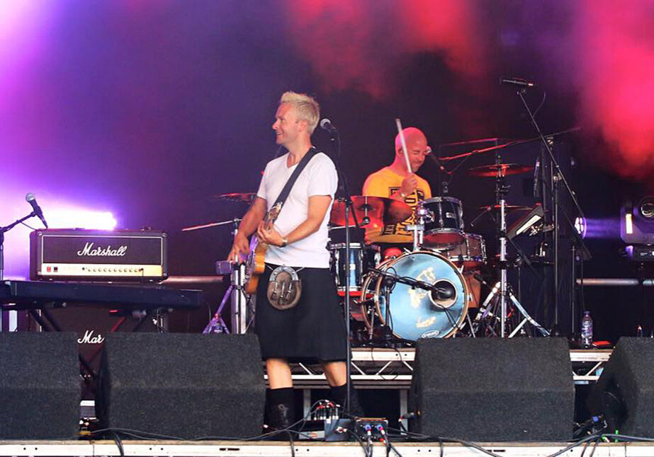 Bahookie perform at a festival