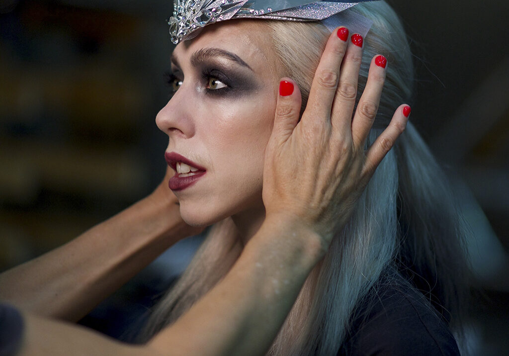 Constance Devernay, is helped into costumer  for Scottish Ballet's The Snow Queen by Christopher Hampson (Photo: Rimbaud Patro)