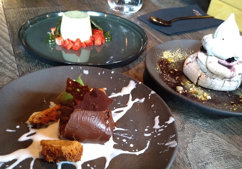 Chocolate orange ganache, the charcoal pavlova and basil panna cotta from the dessert menu at Moskito