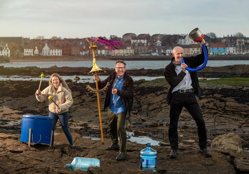 Richard Wemyss (white shirt) and Ellie Deas from the Cellardyke Sea Queen Festival join composer and instrument maker Graeme Leak to turn beach rubbish into musical instruments (Photo: East Neuk Festival)
