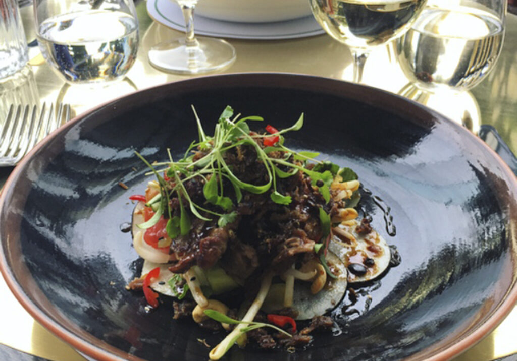 Crispy duck salad with watermelon, black radish and ginger