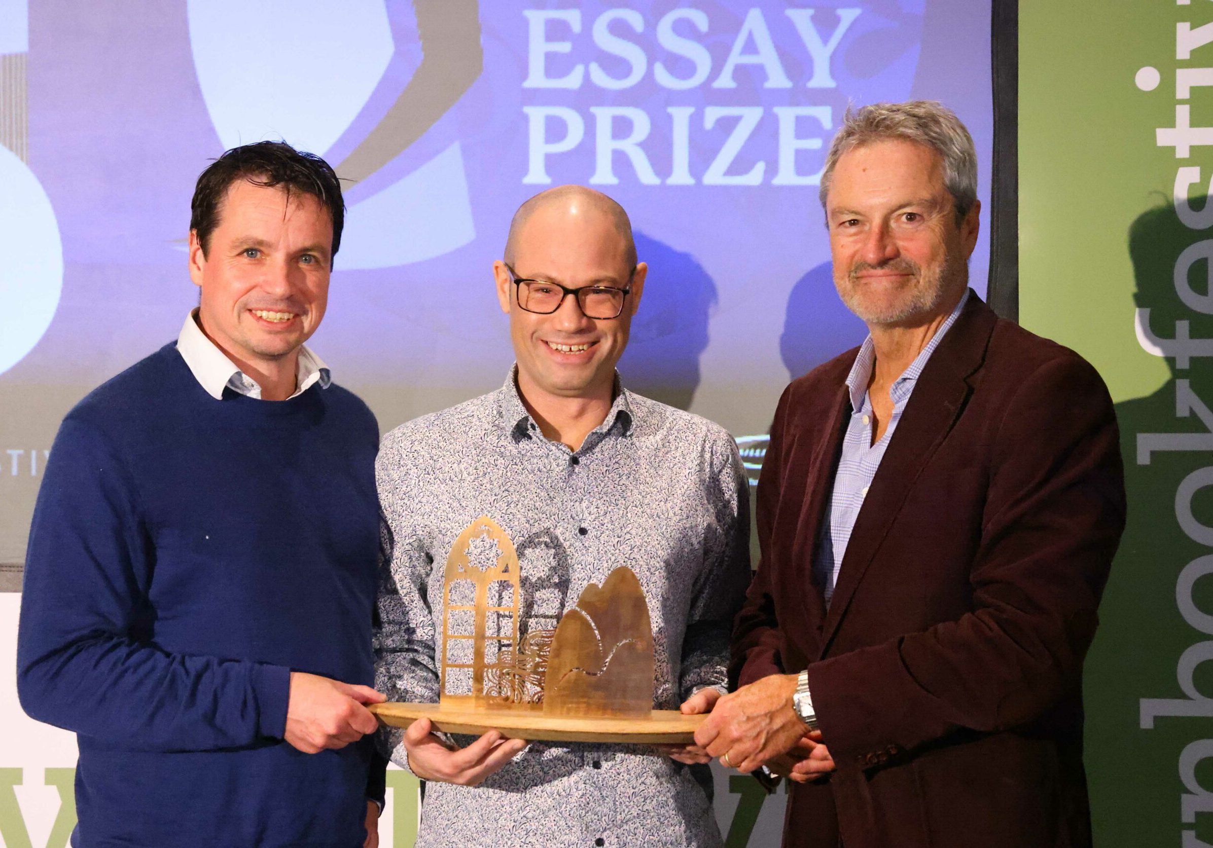 FREE PICTURE:  Anne Brown Prize Winner at Wigtown Book Festival, Mon 25/09/2023: 
 Author Rodge Glass (correct, centre) has been named the winner of the 2023 Anne Brown Essay Prize for Scotland.
 The £1,500 prize, established in 2021 by the family of the late BBC Scotland journalist and Wigtown Festival Company chair Anne Brown, celebrates the best literary essay by a Scottish writer. 
 Best-known for his biography of Alasdair Gray, Glass’s essay On the Covenant explores his relationship with his Jewish family and the idea of what belonging and ties of blood mean. 
 The Essay Prize, which was this year run in association with The Herald, was awarded yesterday [Sunday, 24 September 2023] at a special event at Wigtown Book Festival.
Pictured with Rodge Glass (centre) is Adrian Turpin (left), Creative Director at Wigtown Book Festival and broadcaster and author Gavin Esler (right, chair of the judging panel).
More information in accompanying Press Release and from: Matthew Shelley, PR Consultant for Wigtown Book Festival - Matthew@ScottishfestivalsPR.org - 07786 704 299. 
 Photography for Wigtown Book Festival / Wigtown Festival Company from: Colin Hattersley Photography - www.colinhattersley.com - cphattersley@gmail.com - 07974 957 388.