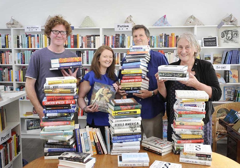FREE PICTURE: Wigtown Book Festival 2018 Programme Launch, Scotland, 16/08/2018:
Packed Programme Unveiled for the 20th Wigtown Book Festival: 
Scotland’s National Book Town celebrates with 10 days of events and entertainment featuring authors, campaigners, comedians and poets - from 21st to 30th September (2018).
Highlights include broadcaster, writer and presenter Clare Balding, comedian Susan Calman who danced her way into the hearts of millions on Strictly, and bestselling author Patrick Gale. And there will also be a series of events as special celebrations for the National Book Town’s 20th festival.  Full information at: www.wigtownbookfestival.com
  Pictured launching the festival programme are (from left) local author Shaun Bythell (correct, who is also the owner of the town’s longest established bookshop, “The Bookshop”),  festival operations director Anne Barclay, and Wigtown authors Mike Morley and Mary Gladstone. Pictured with a rage of books by authors featured in this year's festival.
More information from:  Matthew Shelley, PR Consultant for Wigtown Book Festival - 07786 704 299 - matthew@scottishfestivalspr.org
 Photography for Wigtown Book Festival from: Colin Hattersley Photography - www.colinhattersley.com - cphattersley@gmail.com - 07974 957 388.
**FREE Picture - FIRST USE ONLY** - within 30 days of origination of photography; all other publications to be paid for - please contact photographer for details.