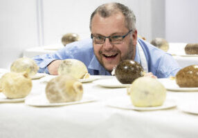 FREE TO USE PHOTOGRAPH..World Haggis Championships 2023.
Jon Wilkin Head Judge in the 2023 World Haggis Championships pictured looking at some of the entries.
for further info please see press release from Maureen Young on 07778 779888
Picture by Graeme Hart.
Copyright Perthshire Picture Agency
Tel: 07990 594431