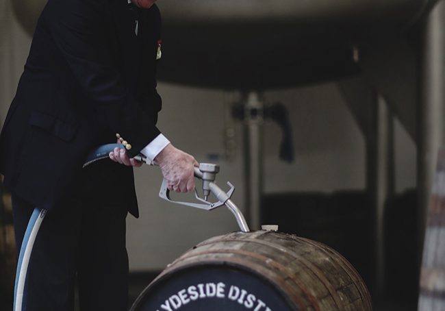  Tim Morrison, chairman of The Clydeside Distillery, fills the first whisky cask with new-make spirit