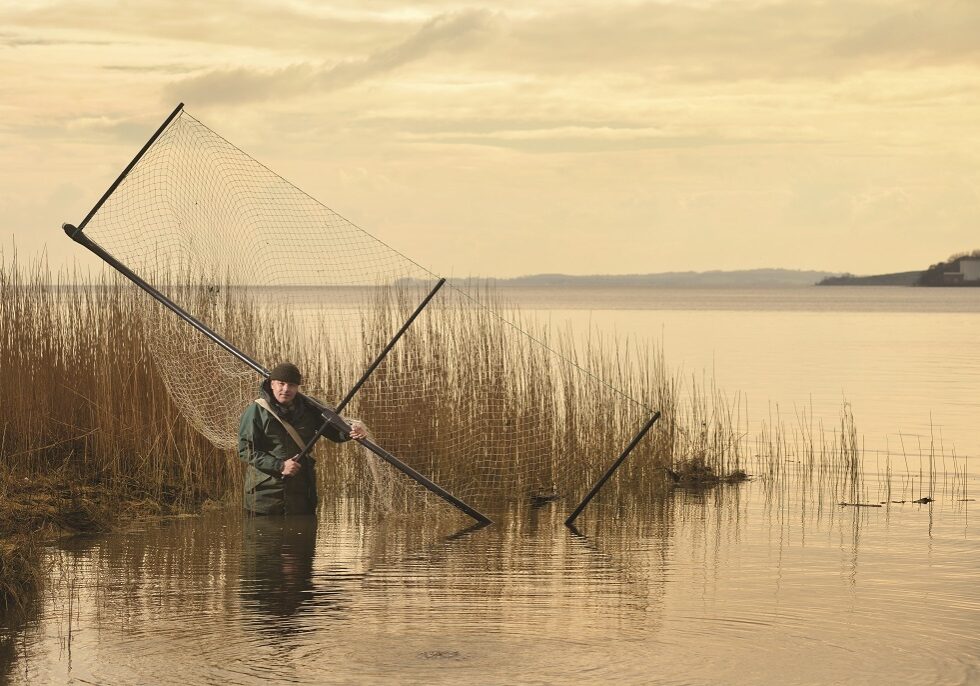 Robbie Cowan
with a haaf net, used in an
ancient form of fishing that dates back to the Vikings