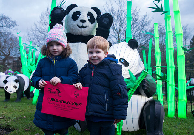 Flora and Archie Scott from Edinburgh help launch Edinburgh Zoo's city-wide treasure hunt for mysterious red envelopes

