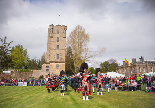 Pipers at a previous Gordon Castle Country Fair and Highland Games