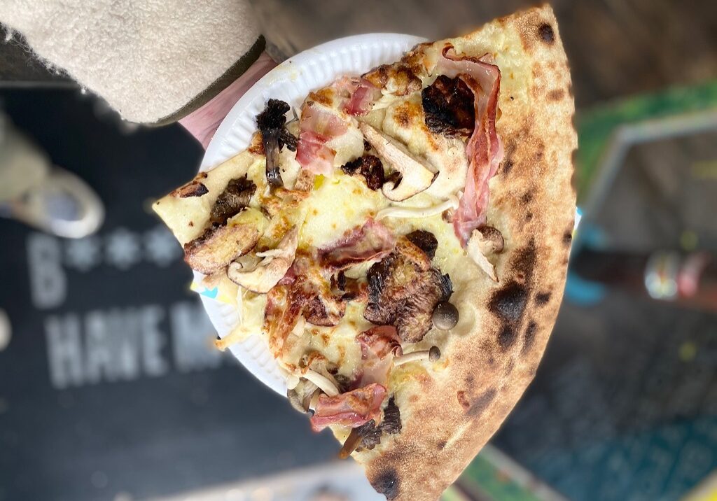 A slice of the Truffle Shuffle pizza