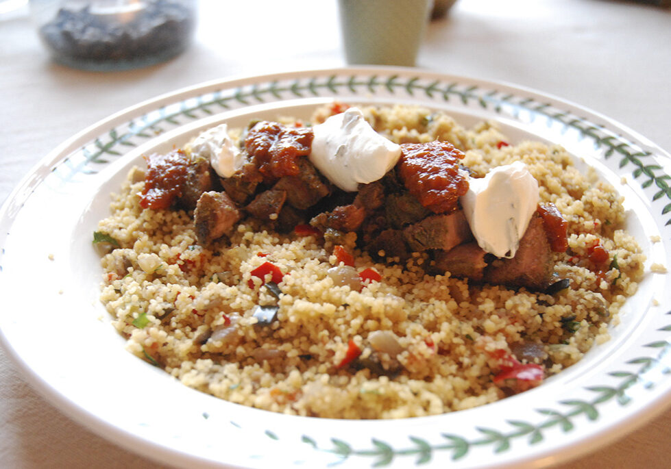 Lamb with spiced Moroccan couscous, mint yoghurt and tomato chilli jam.