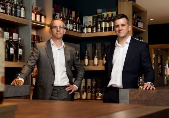 Craig and Daniel Milne of Whisky Hammer raise a dram to celebrate £60 million sales as they celebrate their 100th online auction