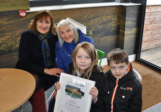 Linda Lawson, Bette McLaren with Sadie Oliver and Kenzie Storrie of Burnfoot Community School