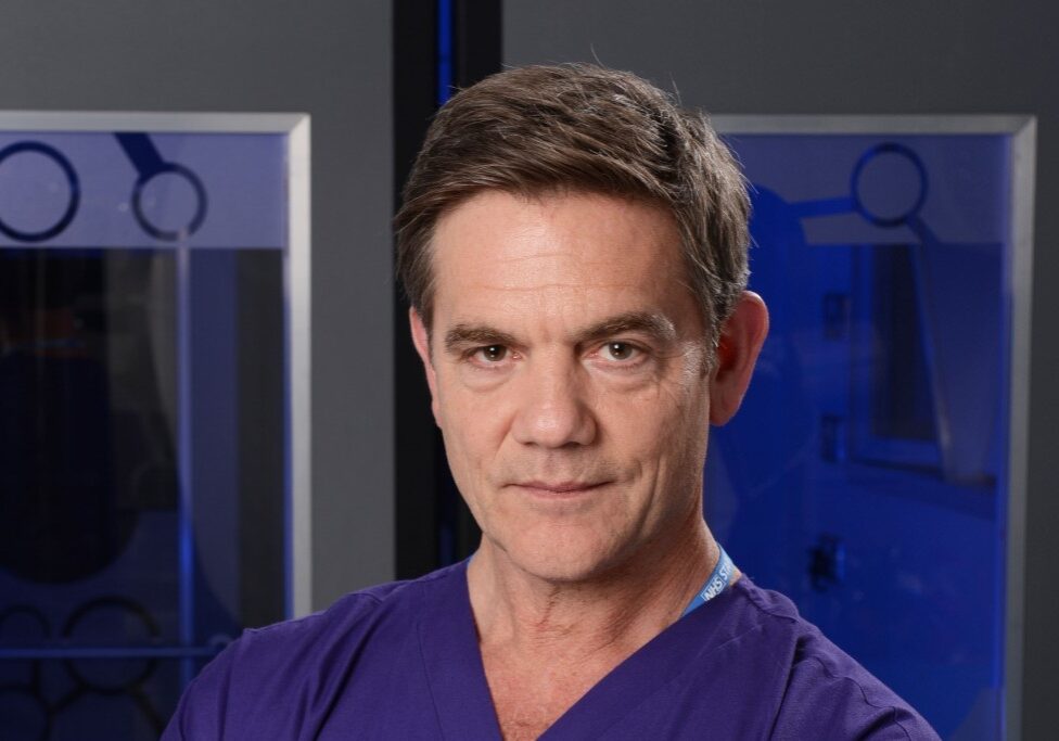 John Michie as Guy Self in Holby City