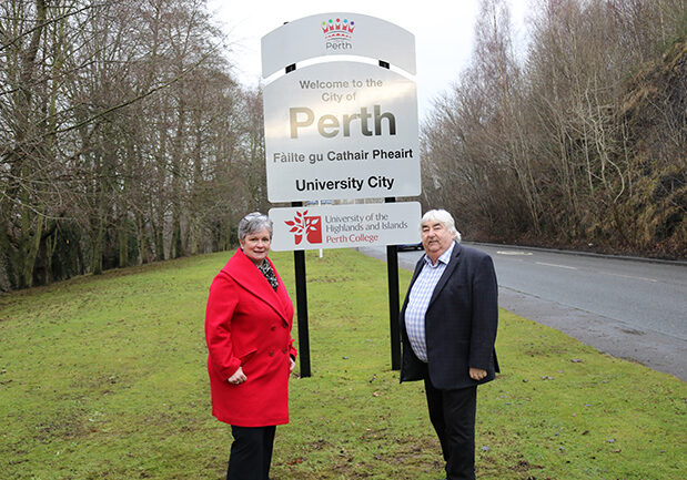 Margaret Cook of Perth College and council leader Ian Campbell, with one of the new signs
