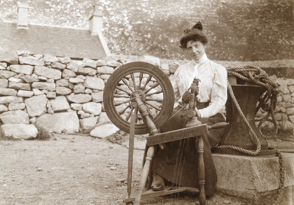 Alice MacLachlan at her spinning wheel on St Kilda