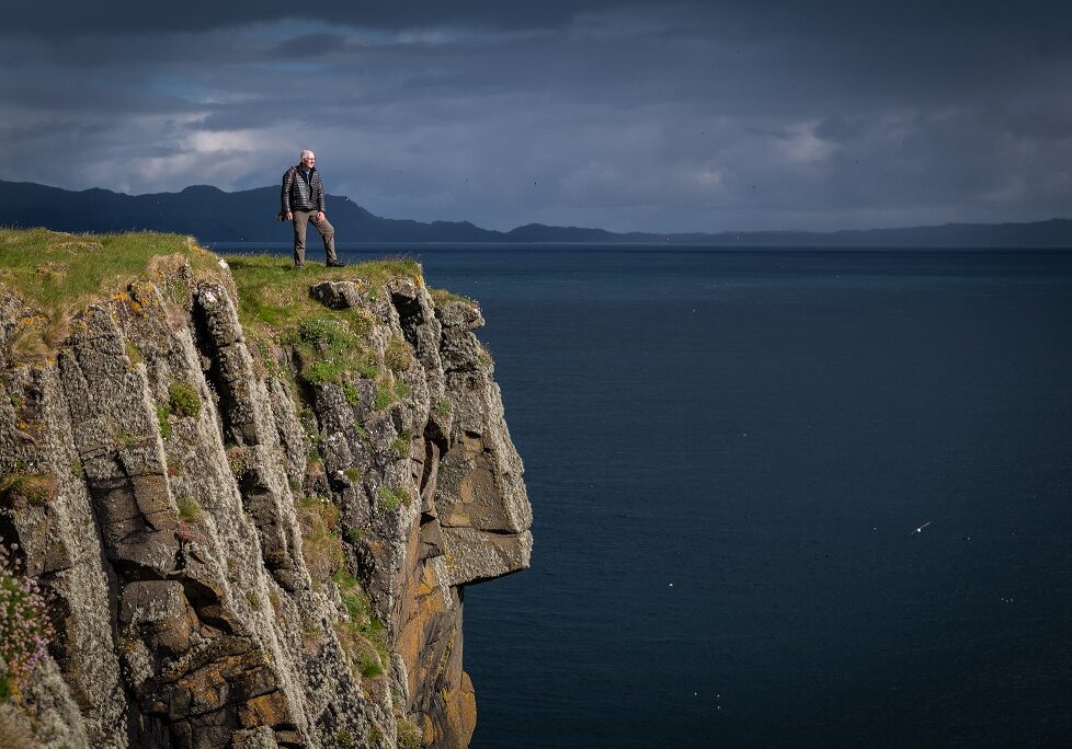 Outdoor photographer Paul Sharman of Hebridean Adventures enjoying the views from the Shiant Isles in the Outer Hebrides. Photograph courtesy of Harry Martin.