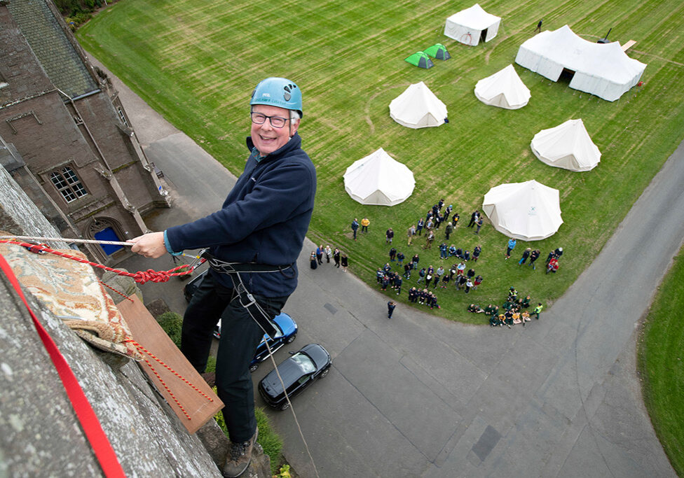 A member of the founding family, Katie Gladstone, joined Warden Hugh Ouston (pictured) to abseil down the tower at the official opening of the event (Photo: Graeme Hart)