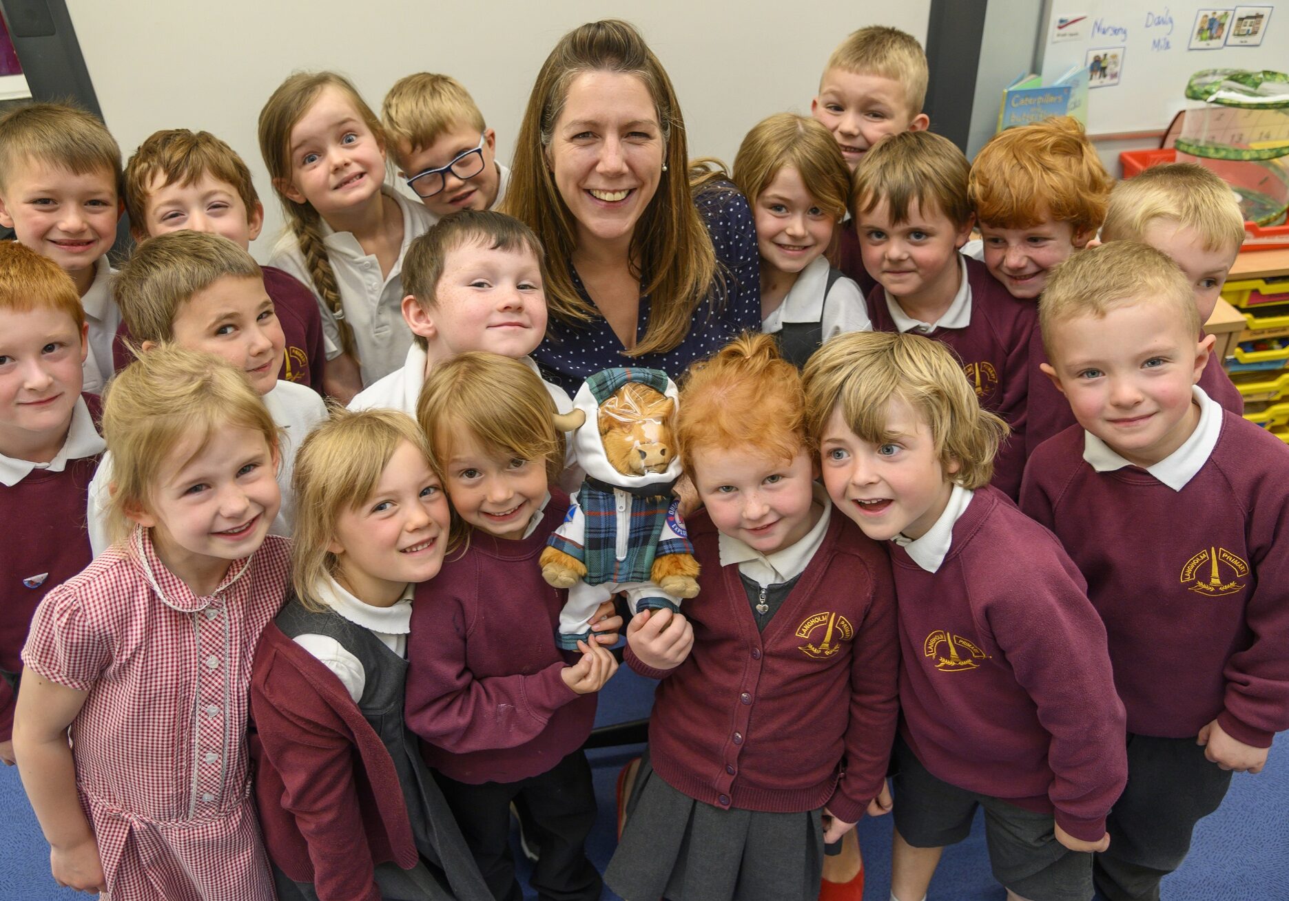 Paula Ward, Regional Leadership Director at VisitScotland, with Langholm Primary School pupils and the Highland Coosmonaut (Photo: Phil Wilkinson)