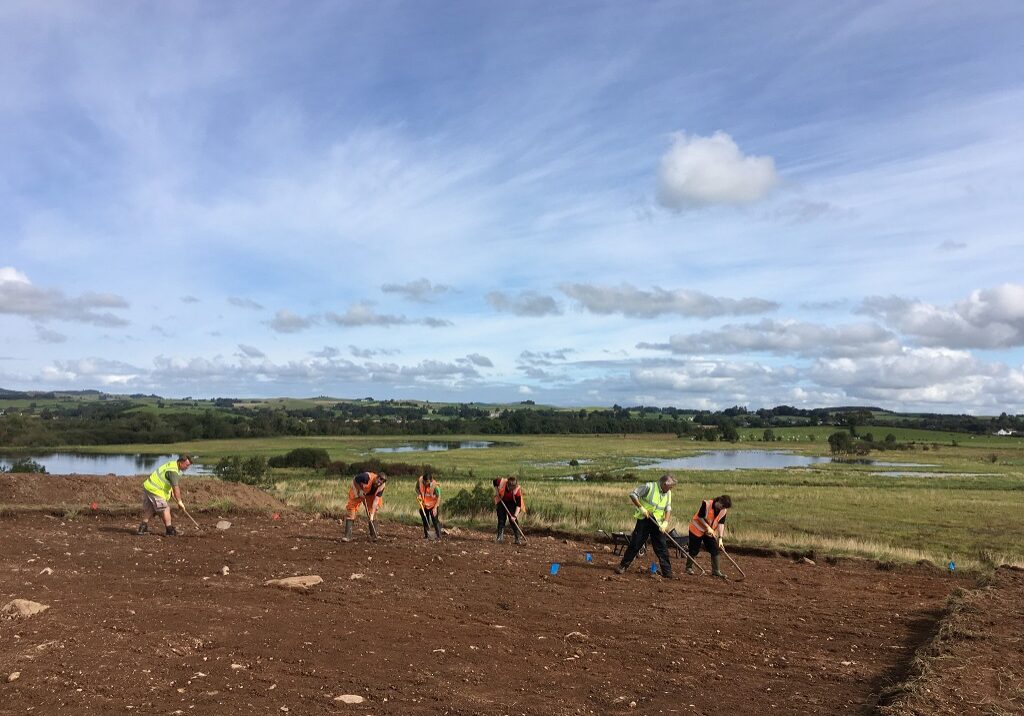 Can You Dig It volunteers enjoying their work at Threave in 2019 / The views of the Threave Estate from Little Wood Hill.