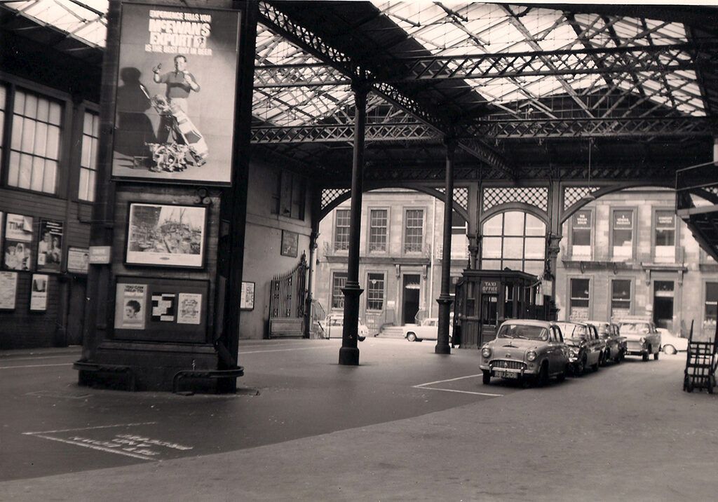 The Princes Street station gates in the days when it was a train station