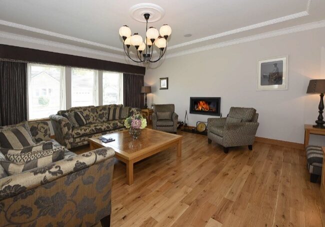 The sitting room is a generously proportioned reception room which is decorated with handsome cornicing