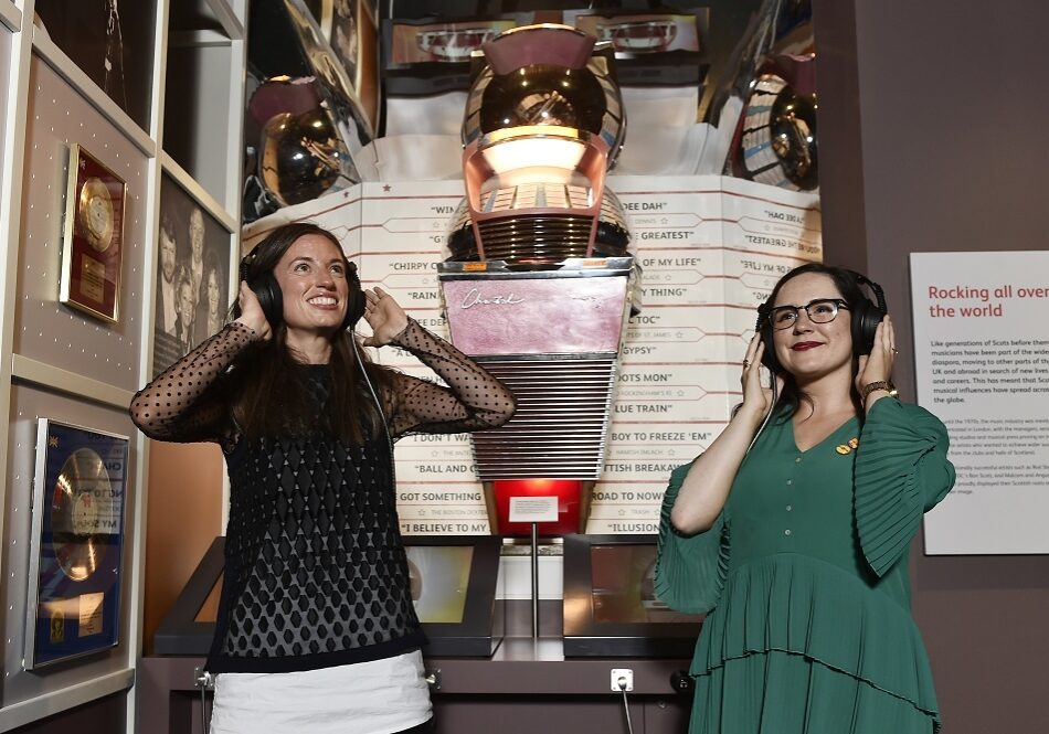 Alice Wyllie and Katie McAllister from National Museums Scotland listen in to the soundtrack of Scotland  (Photo: Neil Hanna)