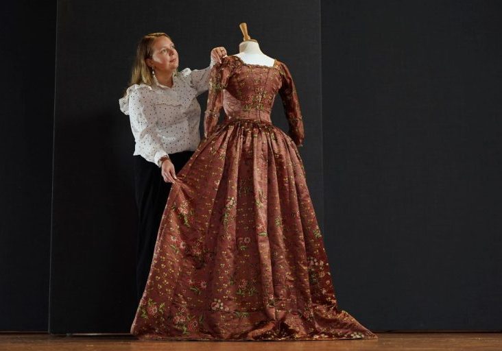 Specialist Kier Alexander with 'Lady Ogilvy's dress'. Credit: Stewart Attwood.