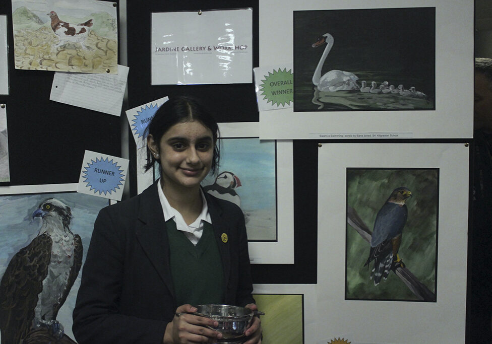 Sana Javed of Kilgraston School with her family of swans in acrylic
